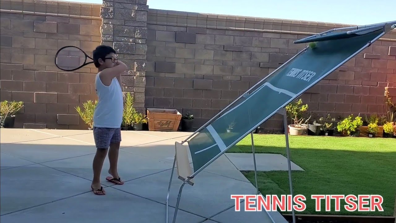 TENNIS BALL REBOUNDER.                             TENNIS TITSER in action on Forehand practice