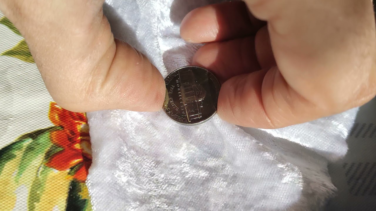 toned proof nickel