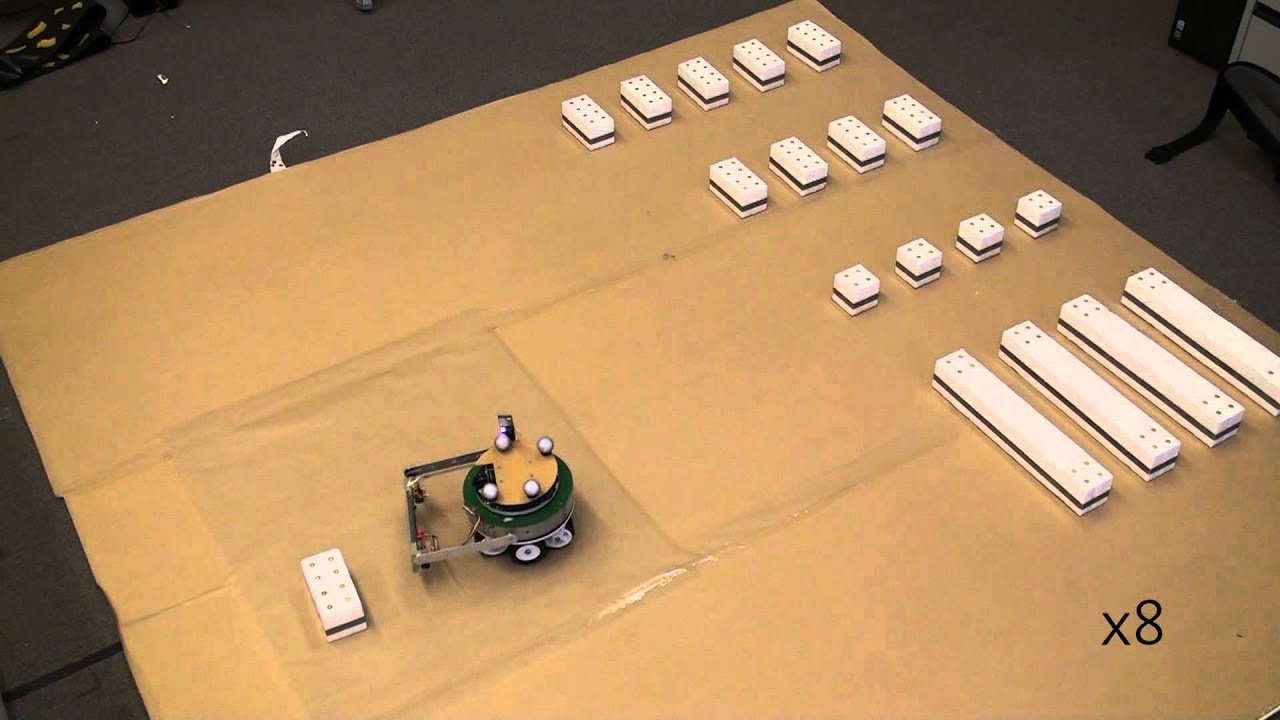 Autonomous Construction of a Roofed Structure: Synthesizing Planning and Stigmergy on a Mobile Robot