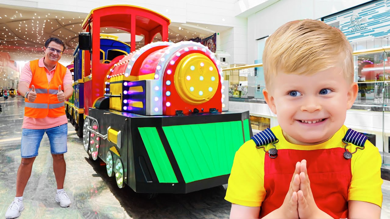 オリバーとお父さんは遊び場で遊んでいます &の他の楽しい家族旅行