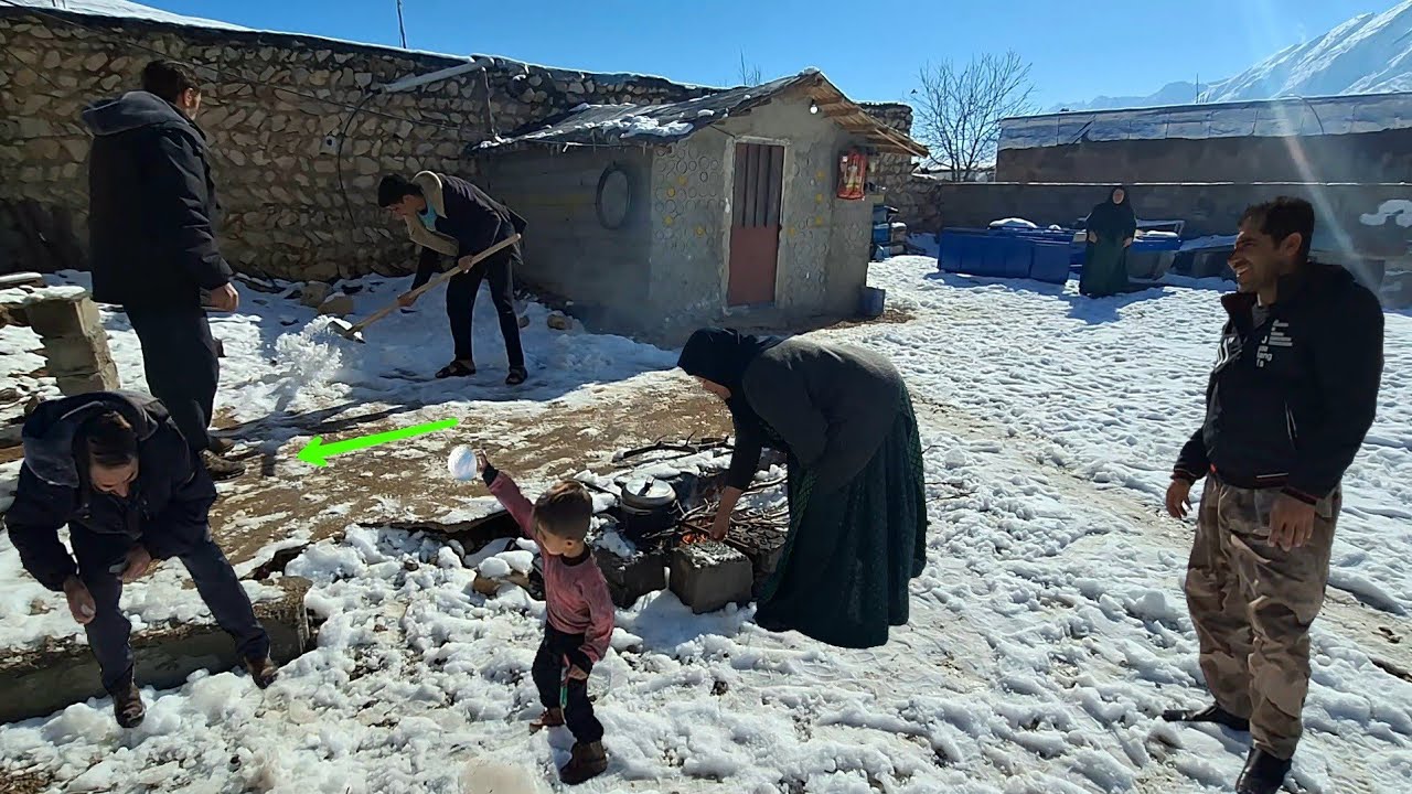 Determination: Morteza and Ali trying to clear the snow from the cave