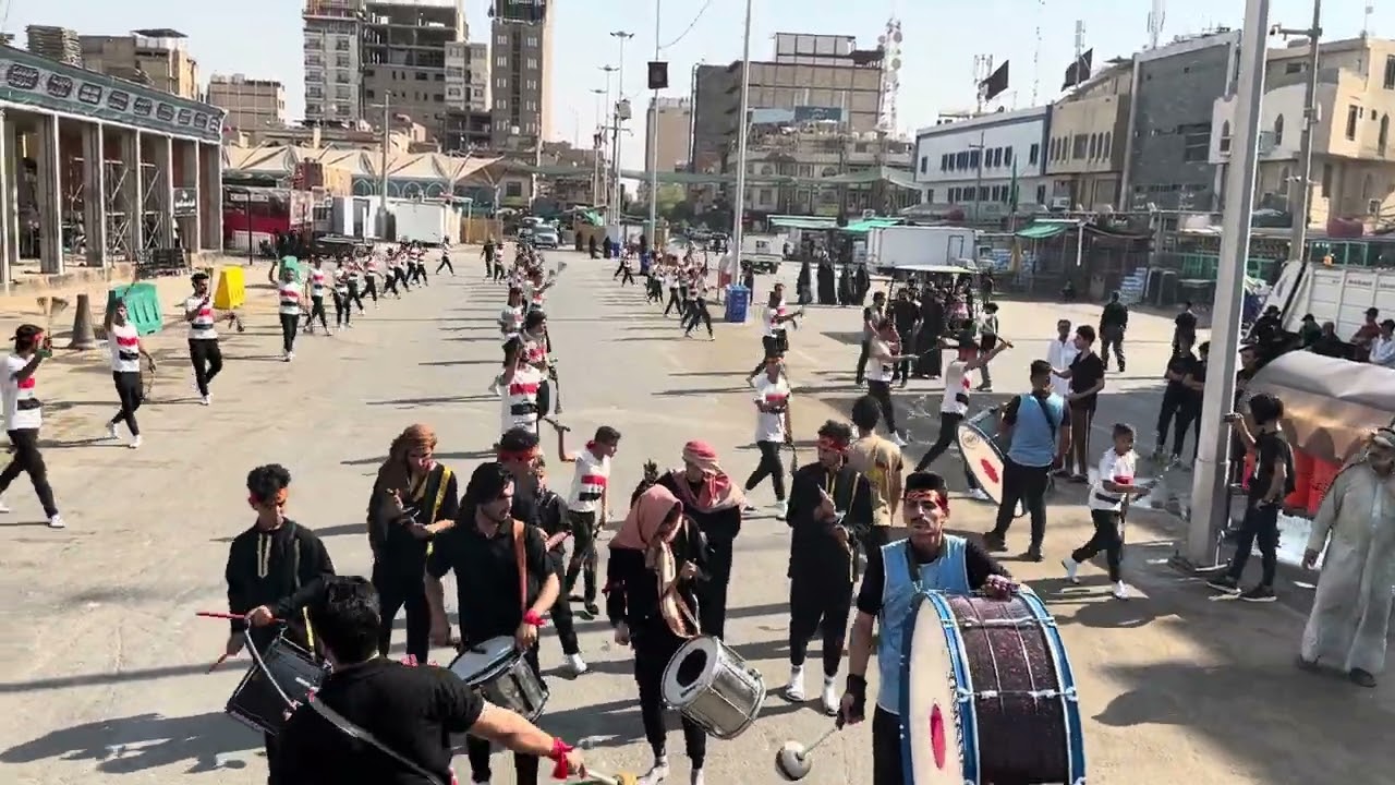 استعراض موكب شهداء الحشد في مرقد الامام العباس ع