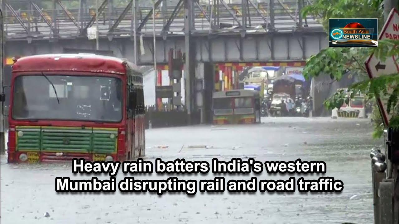 Heavy rain batters India's western Mumbai disrupting rail and road traffic