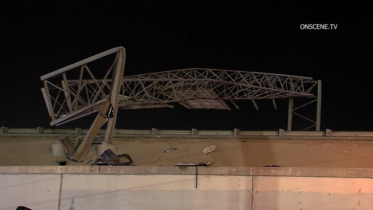 High-Speed Freeway Rollover Crash Takes Out Massive Freeway Sign