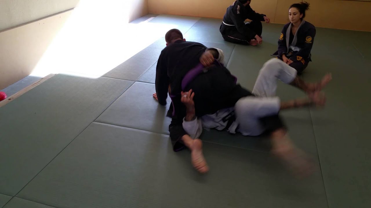 Deep half guard to waiter sweep