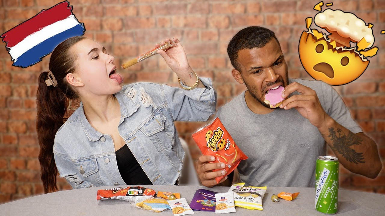 British Couple Try DUTCH SNACKS For The First Time!! | Amy & Tay