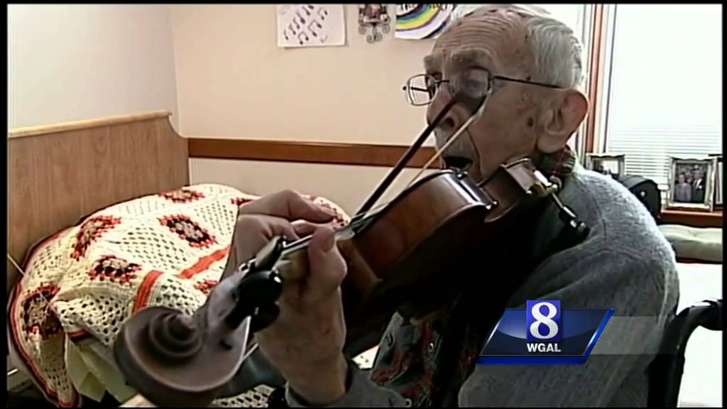 High school invites 100-year-old violinist to play along