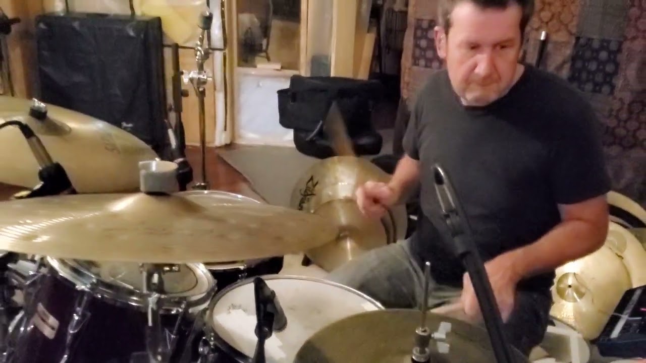 Doug Belote plays New Orleans style drumbeat