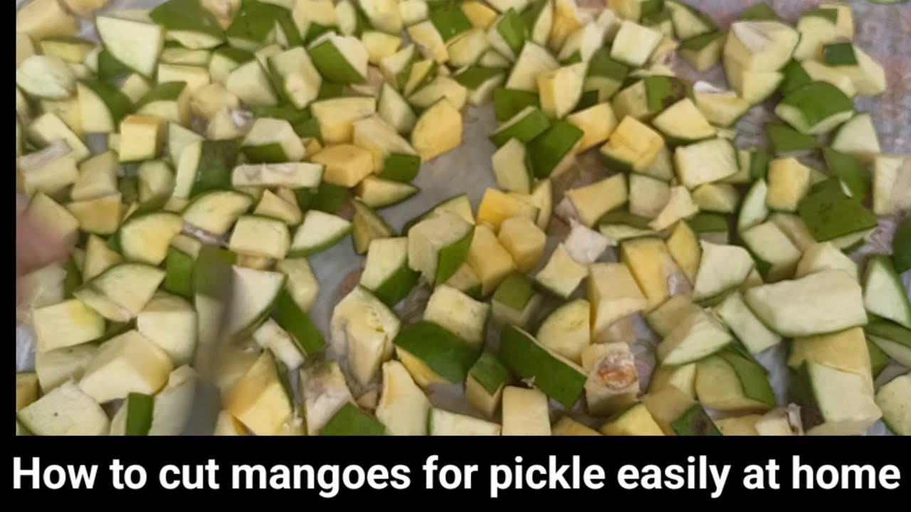 How to cut Mangoes for pickle easy way at home||How to cut Mangoes into spices easily