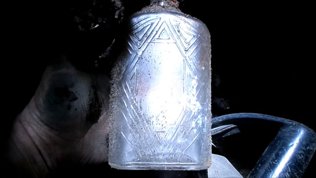 Bottle digging in a 1930's dump