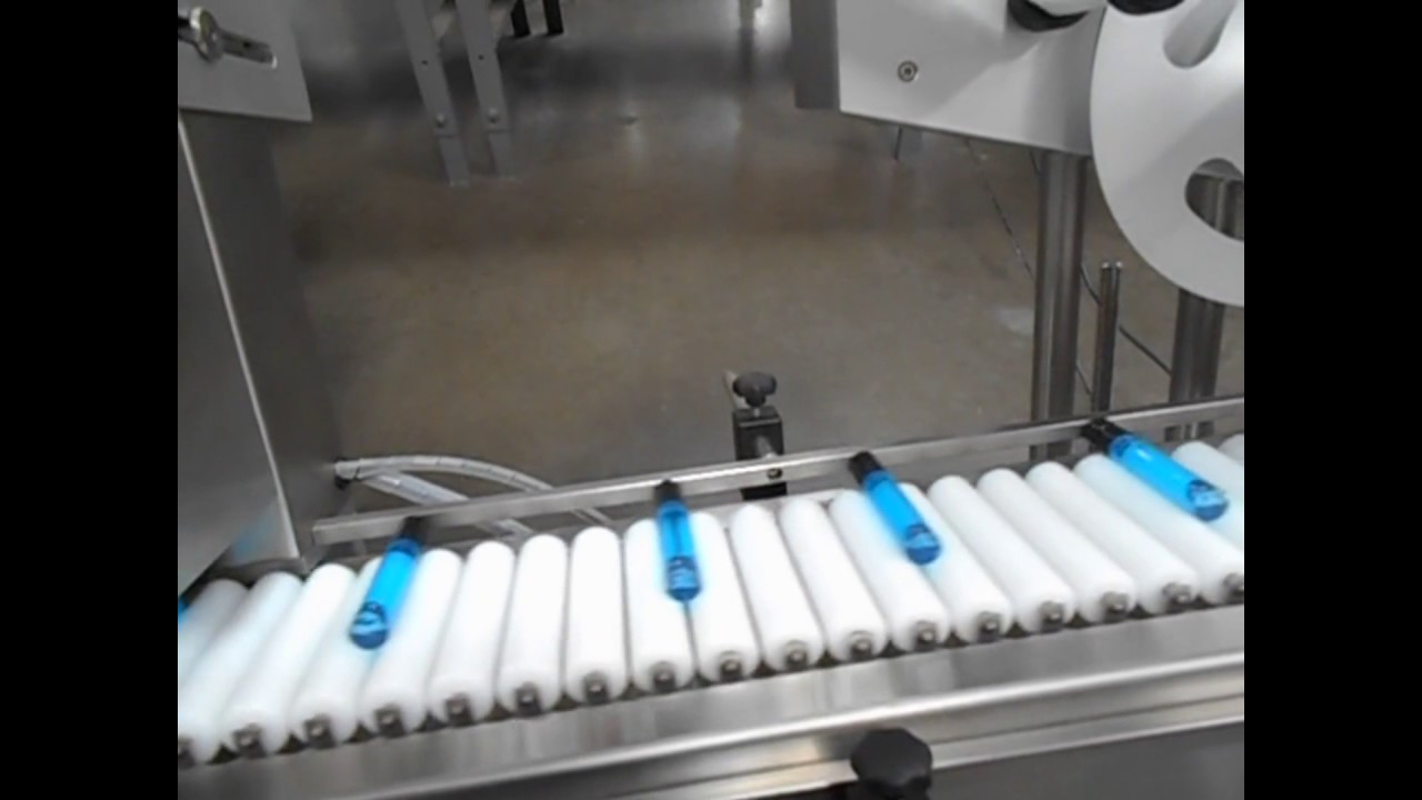 Automatic Horizontal Wrap Labeler - Pressure Sensitive Labeler - Accutek Packaging Equipment
