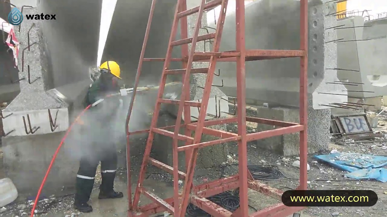 hydrodemolition machine - high pressure water jetting the concrete or cement with the UHP water