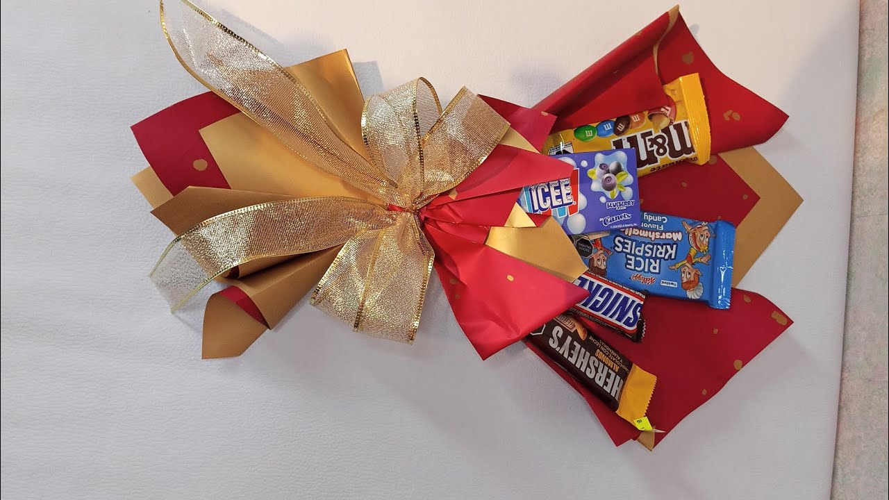 TUTORIAL COMO HACER UN RAMO DE DULCES O CHOCOLATES  SAN VALENTIN SORPRESA #TUTORIAL # COMO HACER