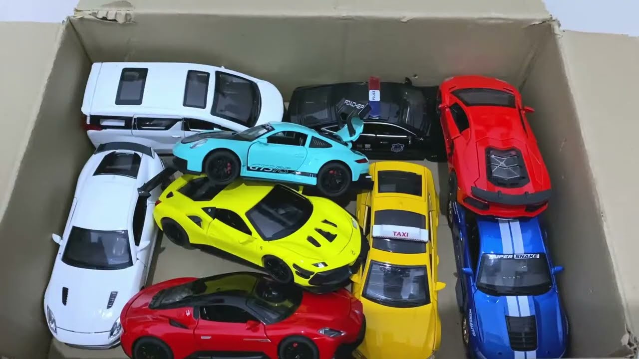 Box Full of Model Cars – Corvette Stingray, Lotus Evija, BMW M4, Audi R8, Lamborghini Revuelto