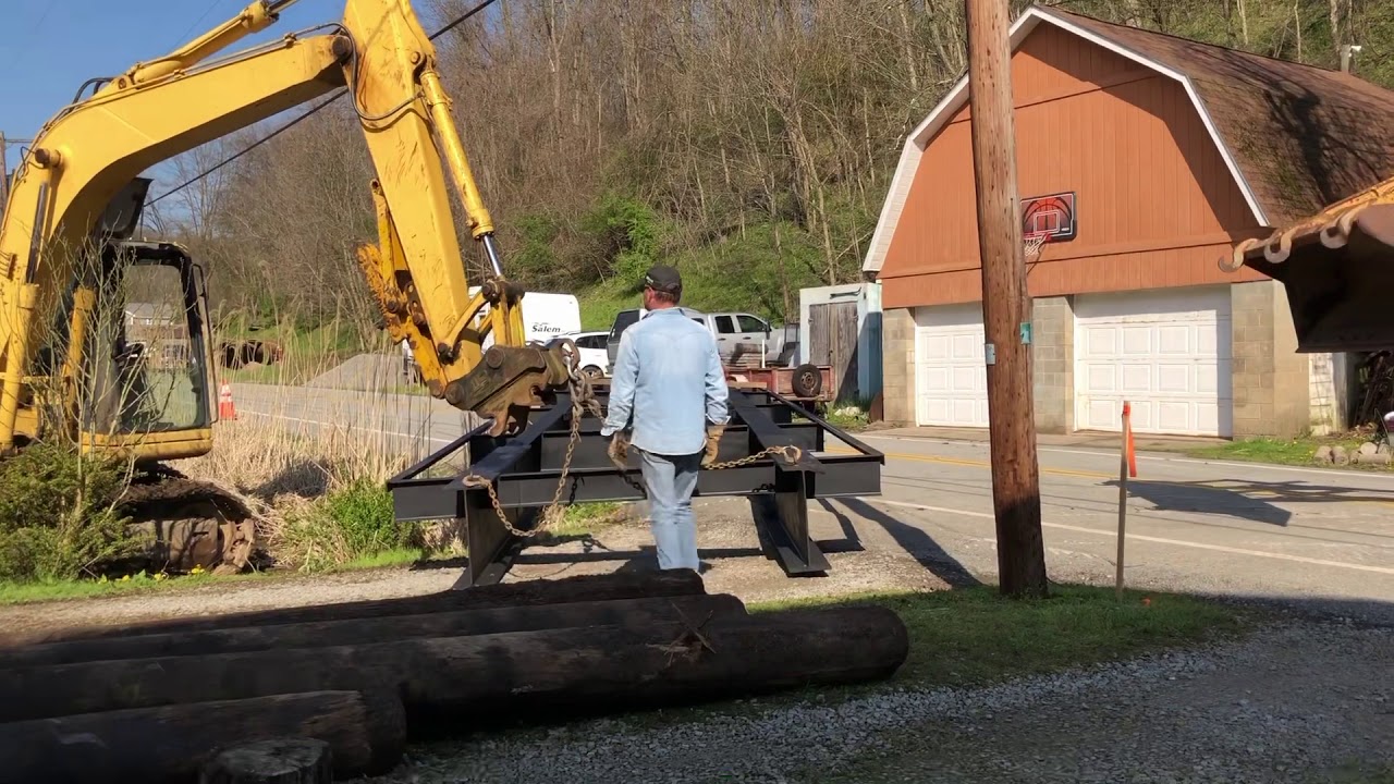 Building a I beam bridge across a creek,  moving and setting