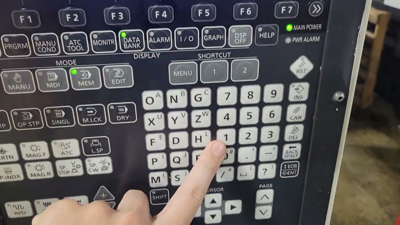 How to select pallet programs on Brother 450 CNC mill