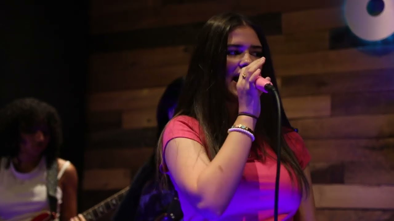School Of Rock Charlotte's House Band performs 