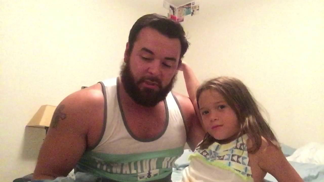 Stuttering dad reading to his daughter
