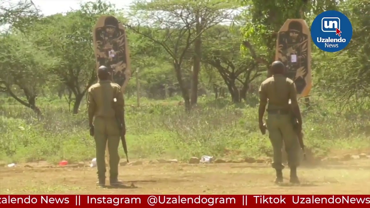 National Police Reservist graduands unmount and mount Guns before CS Kindiki after their Training