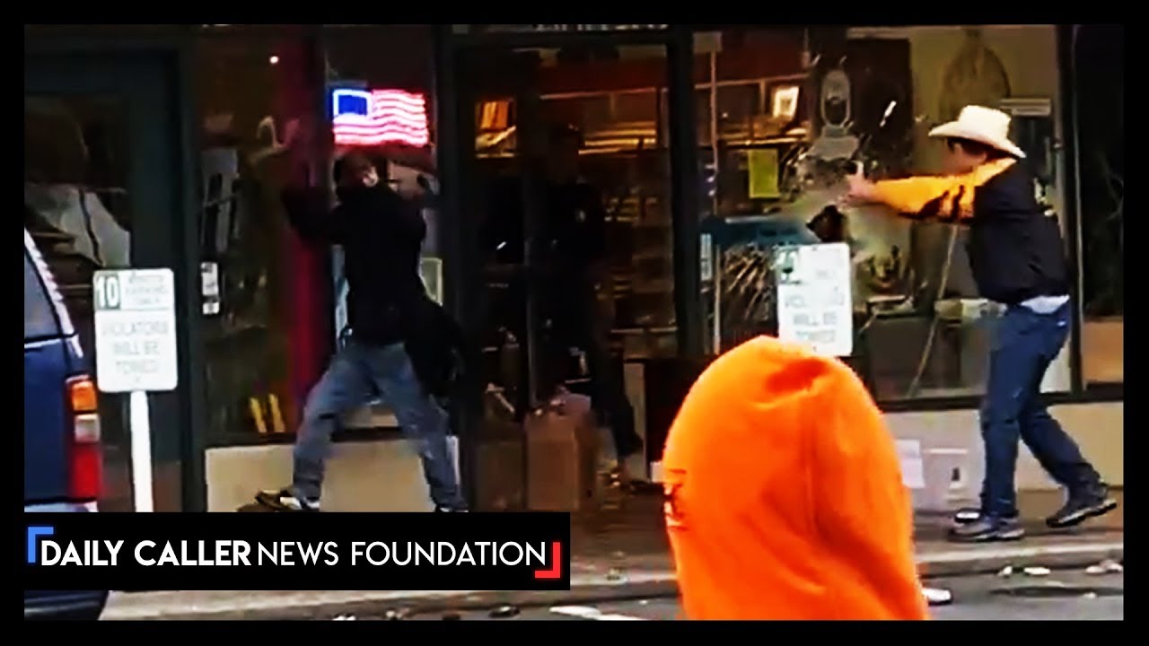 Man Uses A Gun To Clear Business Of Looters