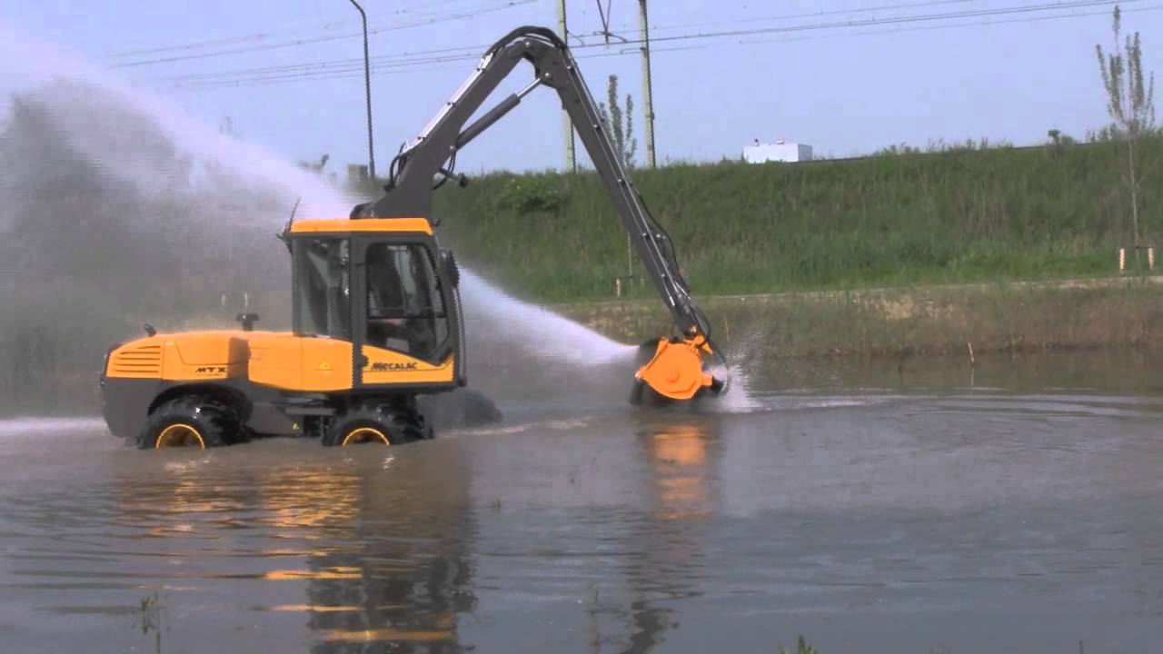 Mecalac carwash met de herder klepelbak