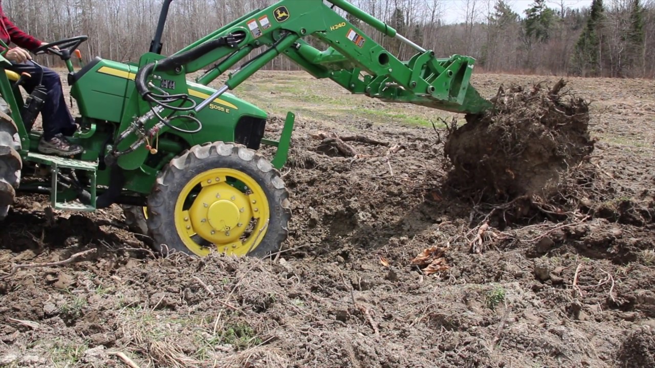 Removing Large Stump with Stump Bucket