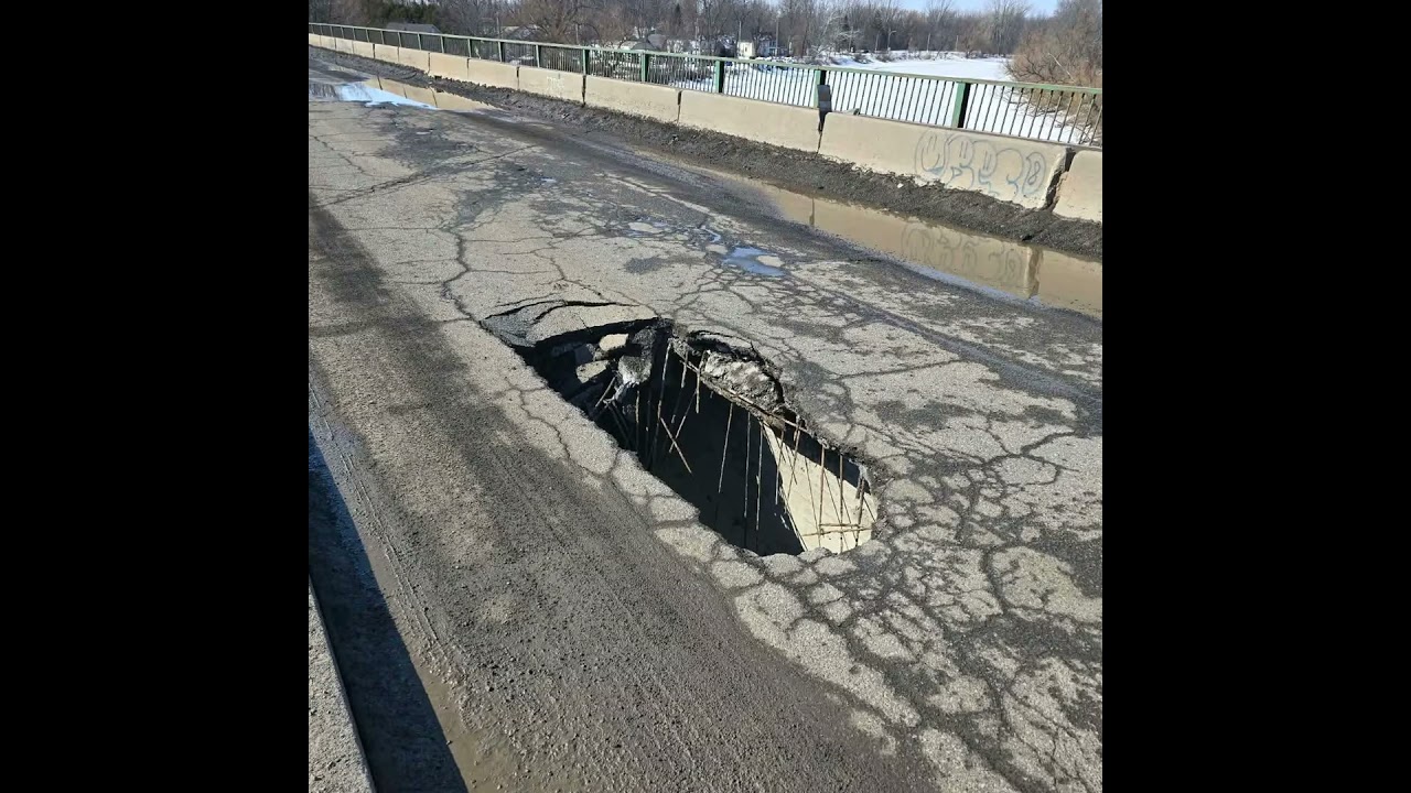 A huge hole opens up a Sauvagine Bridge in Chateauguay. How did it happen?