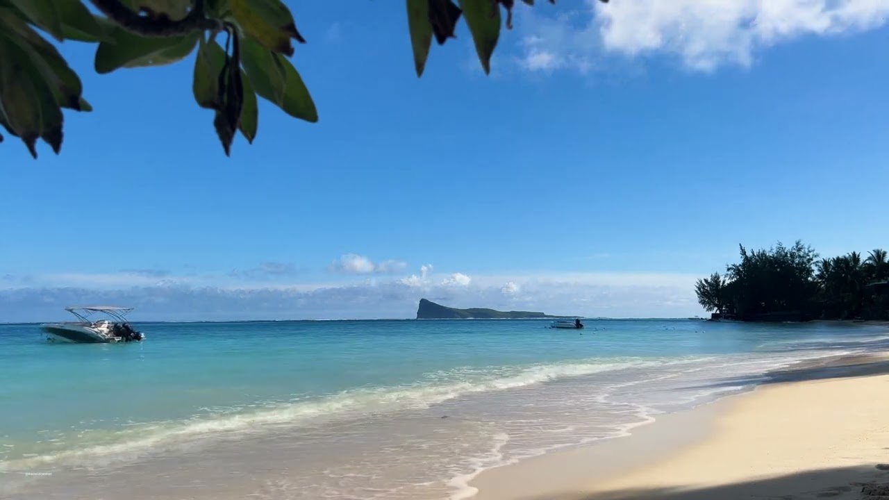 4K | Experience the soothing sounds of ocean waves while enjoying the vibrant blues  of Mauritius