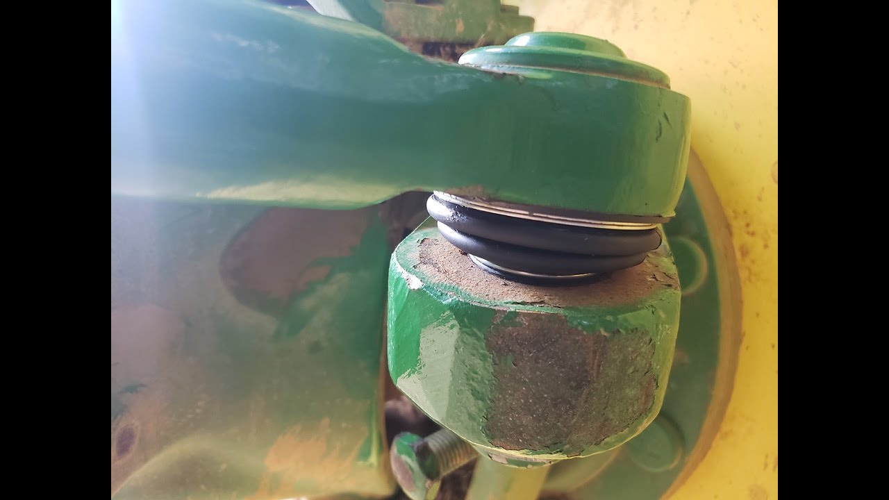 John Deere steering repair, ball joint boots, replacing tie rod rubbers on a 6930 tractor.
