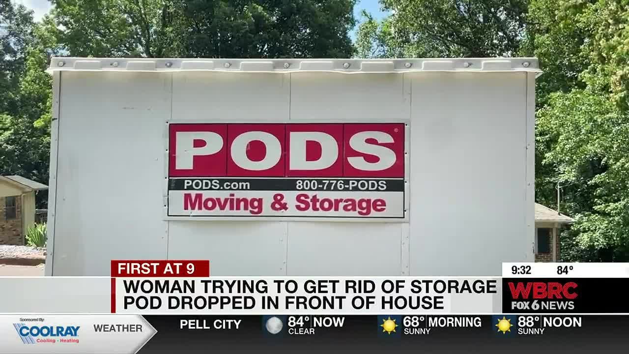 Woman trying to get rid of storage pod dropped in front of house