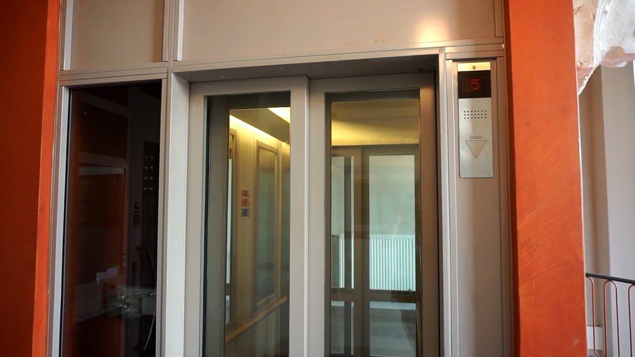 Glass doors 1996 KONE M traction elevator @ Bredgränd 7, Uppsala, Sweden