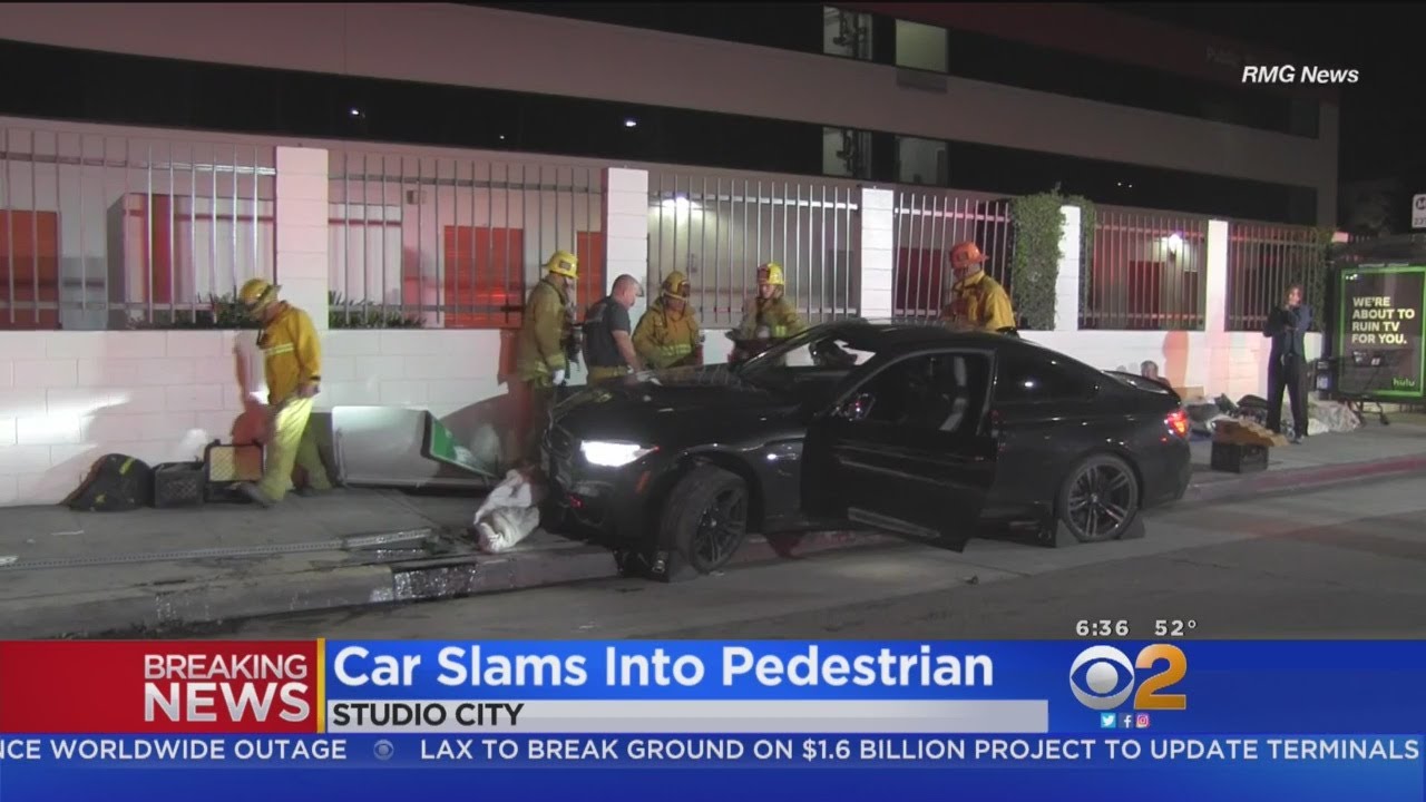 Driver Arrested After BMW Hops Curb, Lands On Sleeping Homeless Man