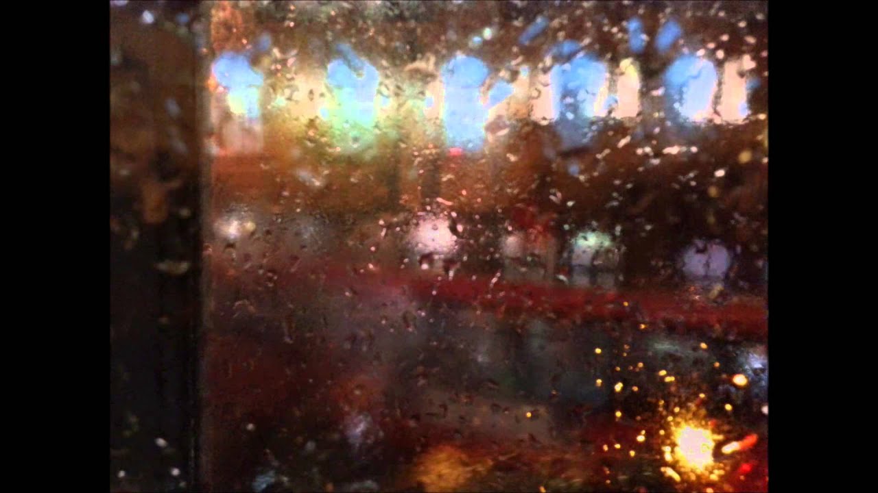 London through rainy bus windows