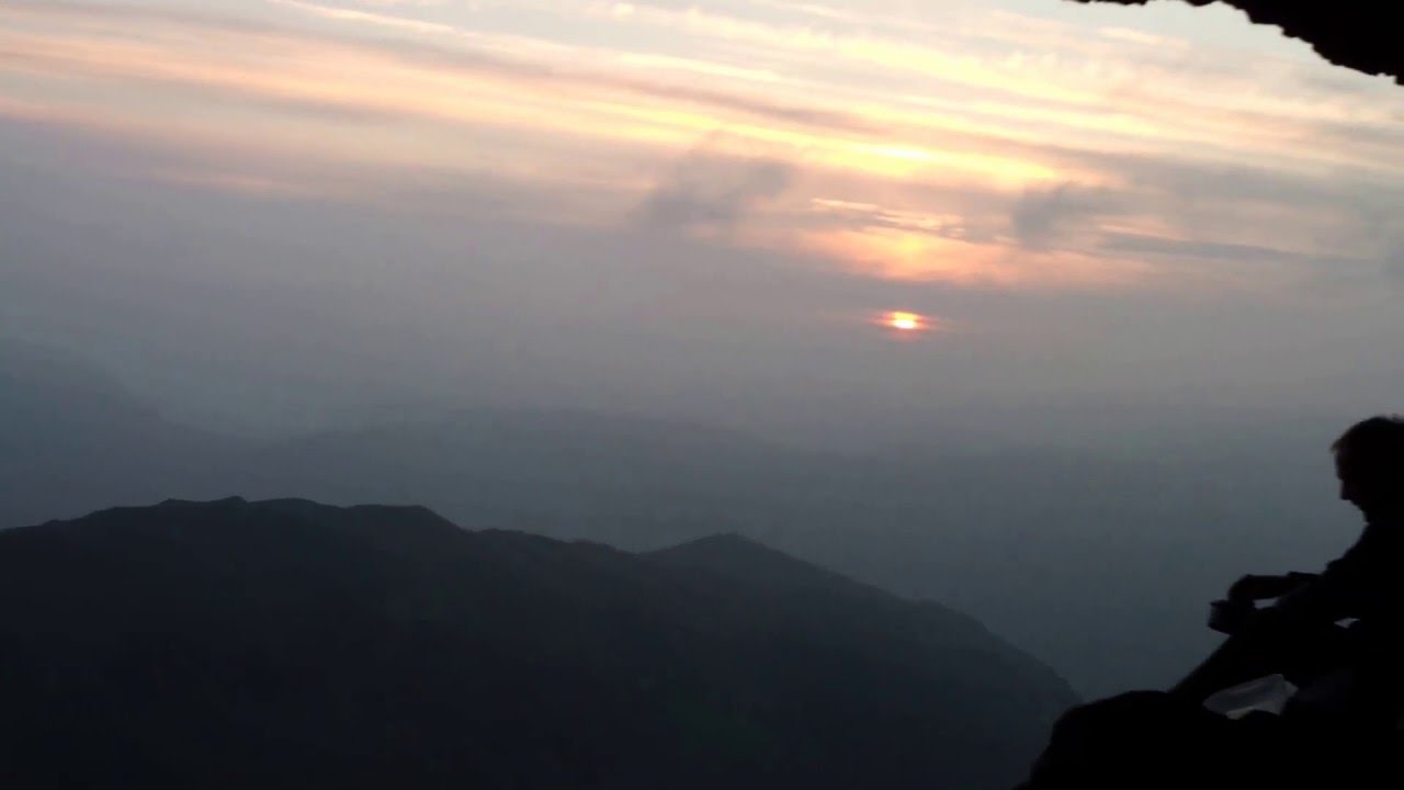 Waking up to Sunrise, in the Priests Hole Cave, Dove Crag - wild camping