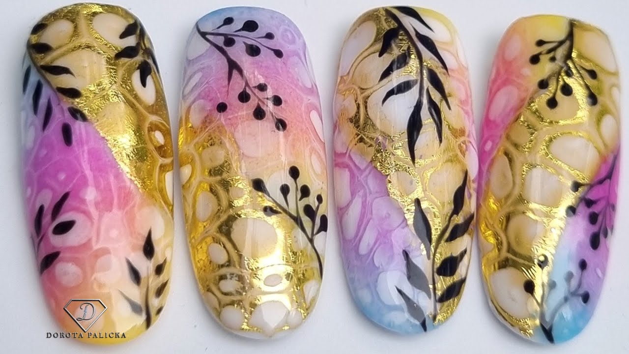 Blooming gel with transfer foil nail art. Summer nail design.