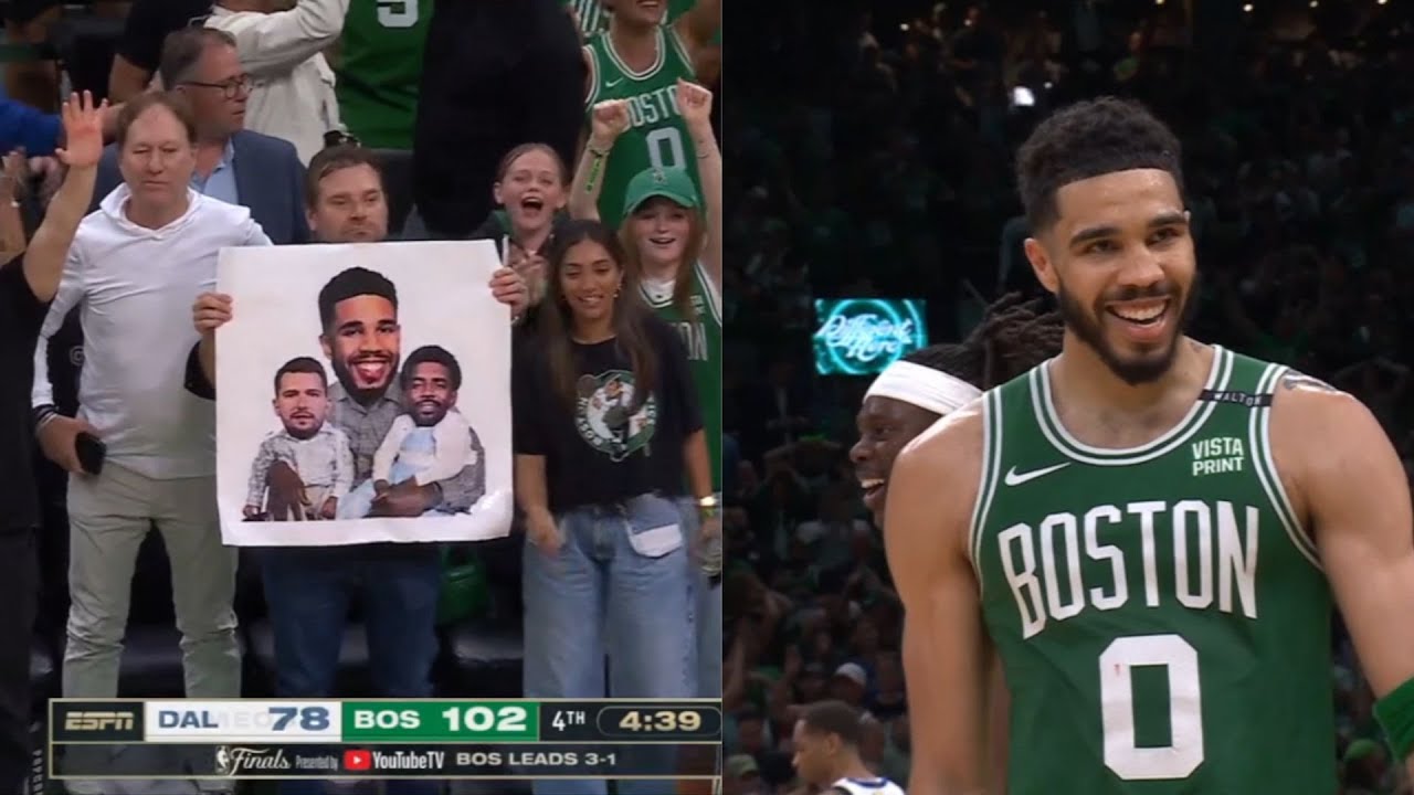 Celtics fan shows Jayson Tatum on carrying baby Luka and Kyrie sign 🤣after he scores | NBA Finals G5