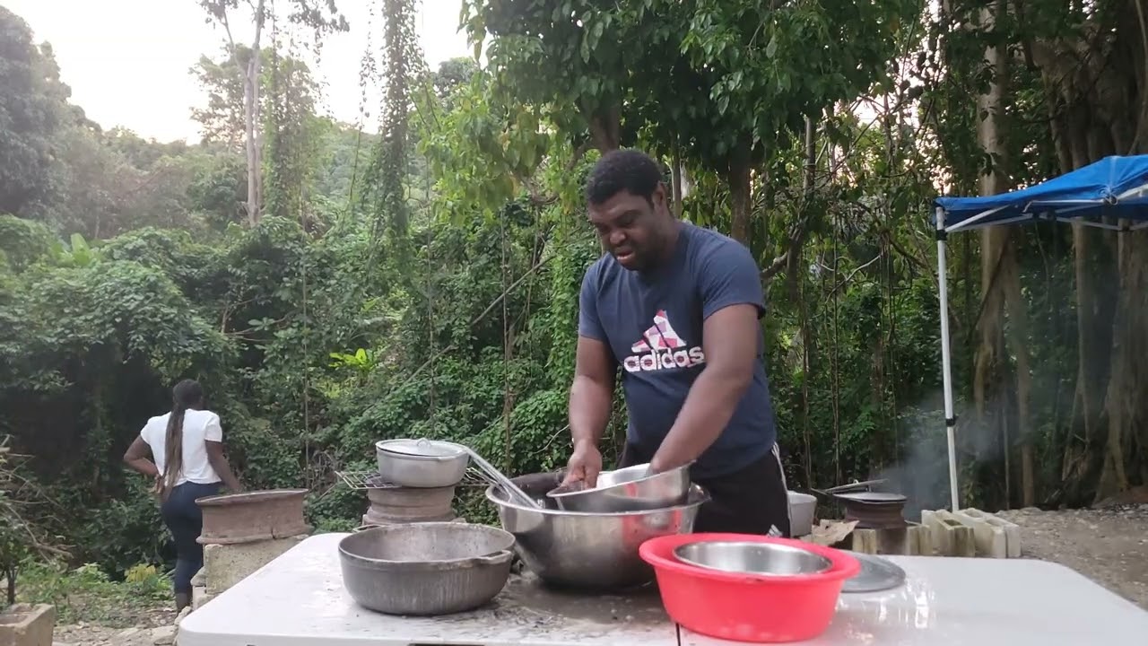 Helping out my brother J bud di Baker getting the pots dem clean up