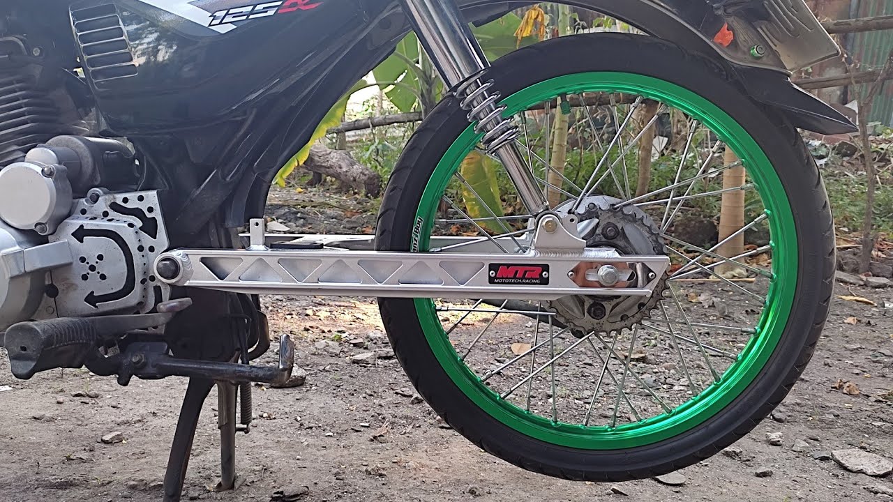 Installing plus 2 swing arm for tmx 125 / stock hud