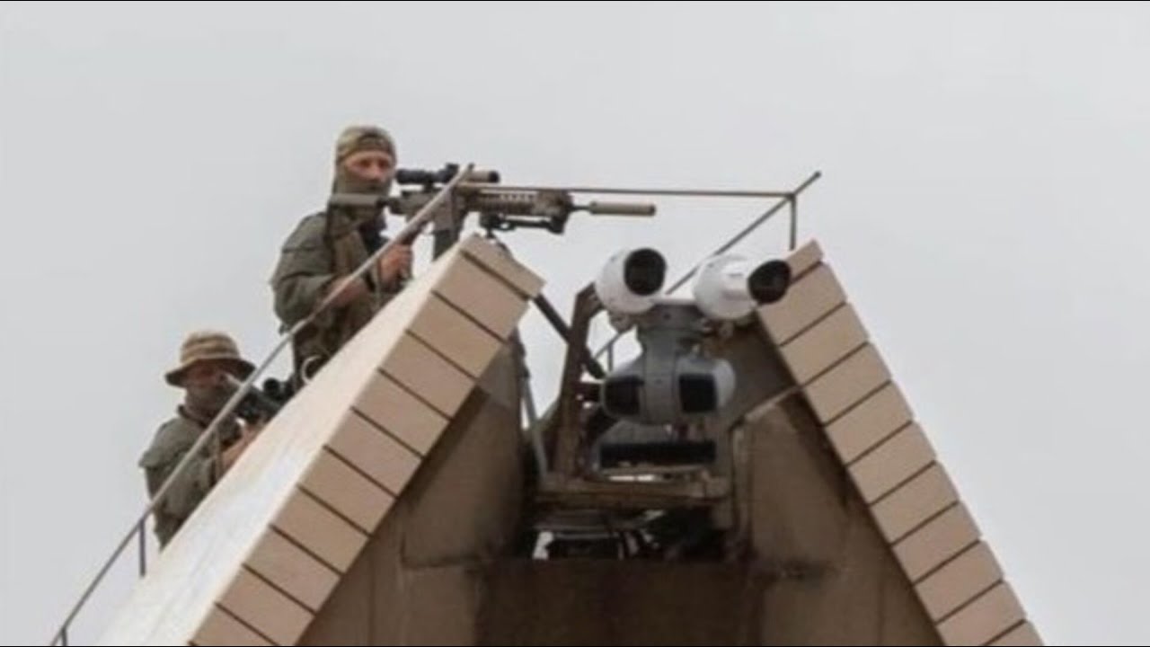 Police snipers at Sydney Opera House memorial sparks debate