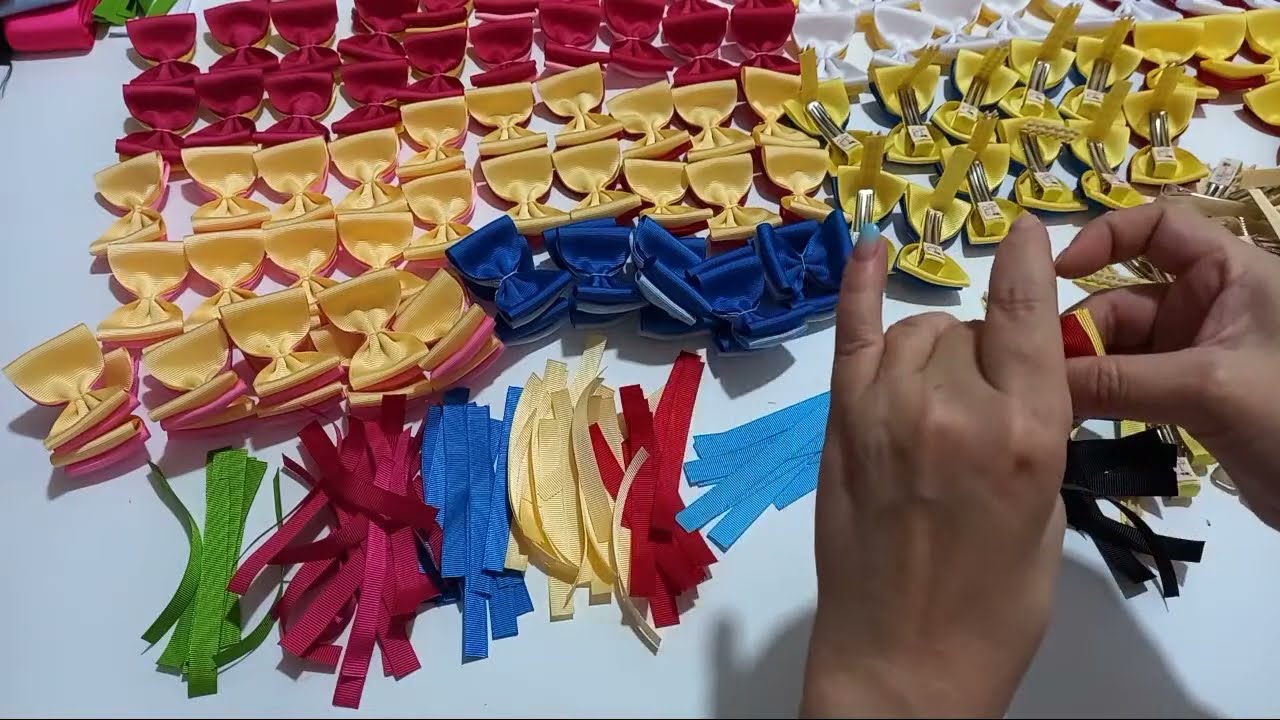 Produção de 100 laços - fazendo acabamento