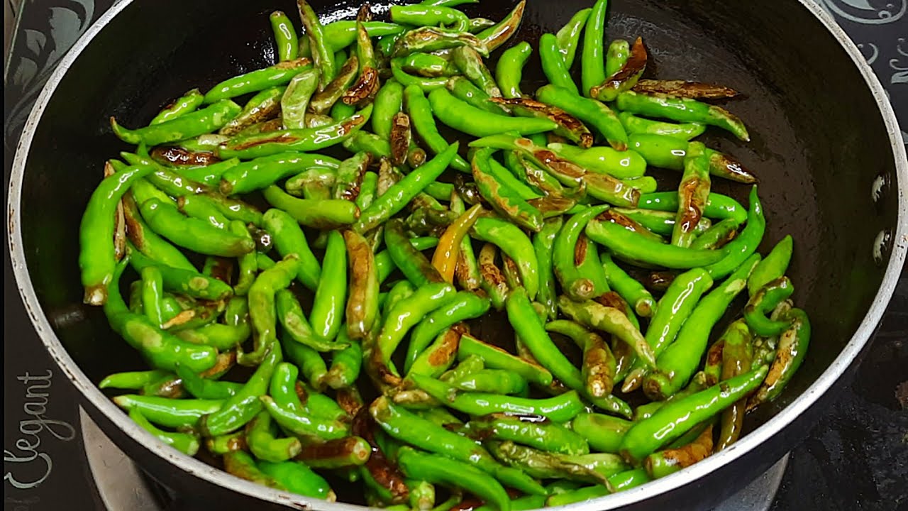 This recipe for fried green chilies in oil has a delicious taste that will make you want to eat i...