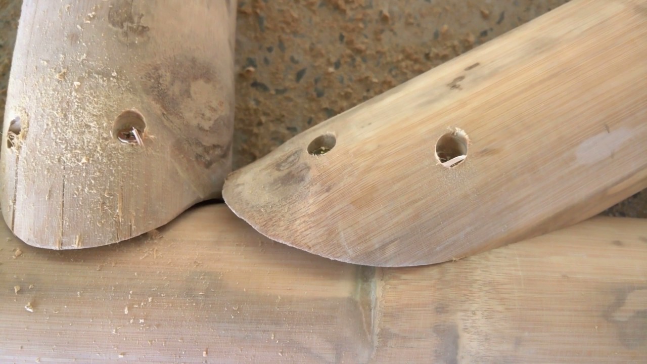 Shoot hard screws bamboo poles bamboo house