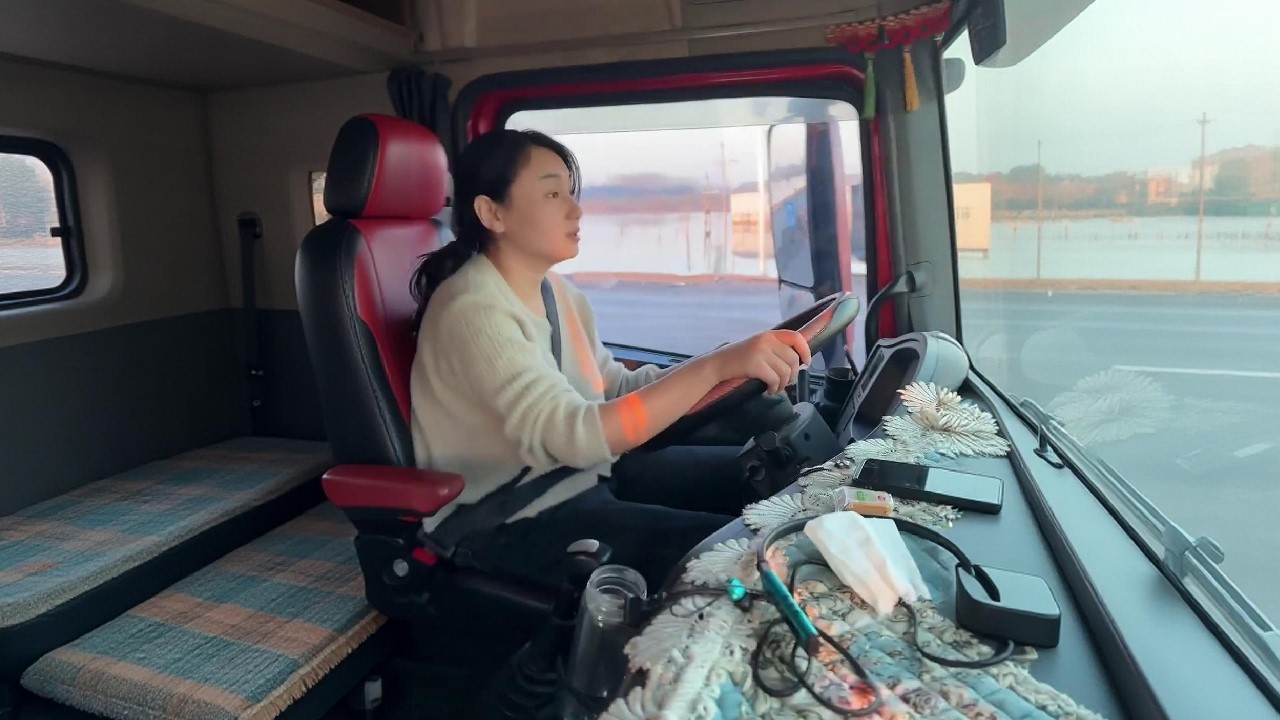 Women hold up half the sky, driving trucks to support their families.