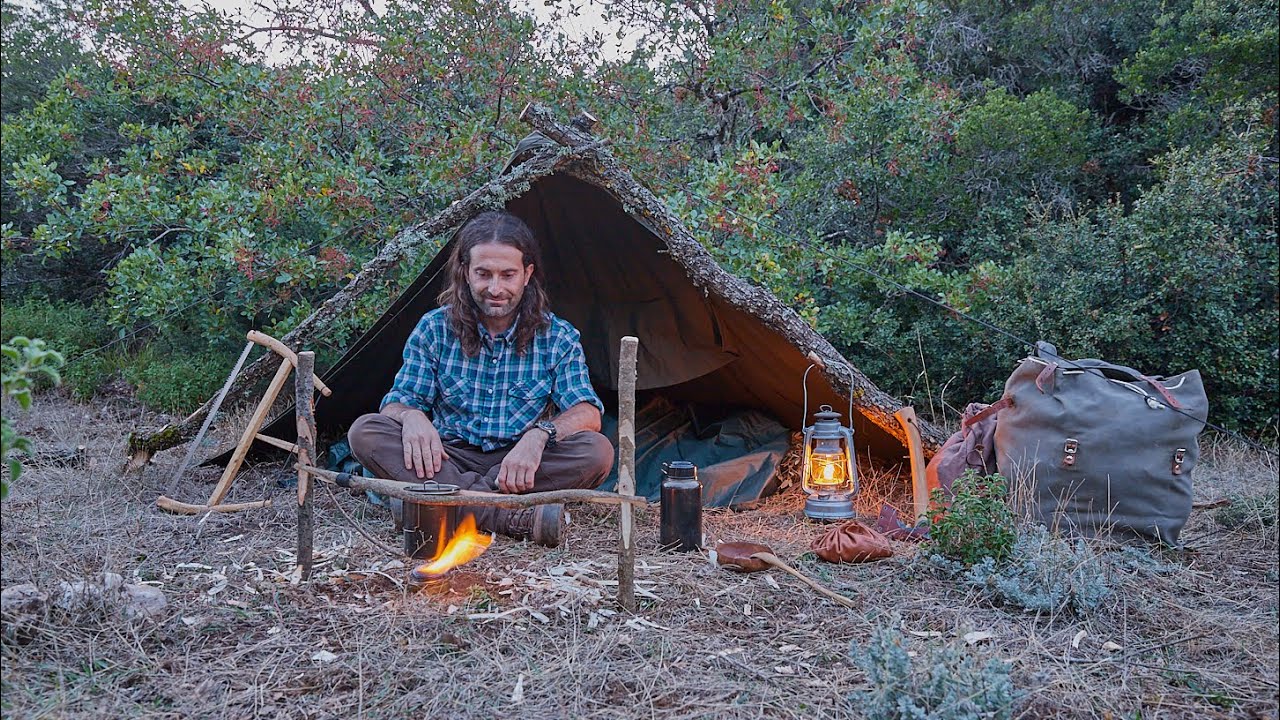 Bushcraft- Wild Boars, Canvas Lavvu, making fixed adjustable pot base for cooking, etc