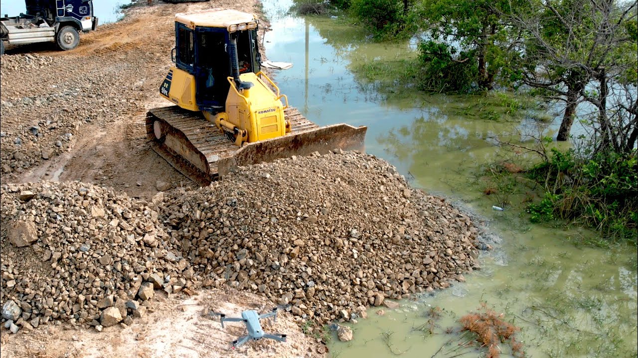 Extreme Bulldozer Pushing Backfilling UP To Prevent Flood | KOMATs'u DR51PX Spreading Stone