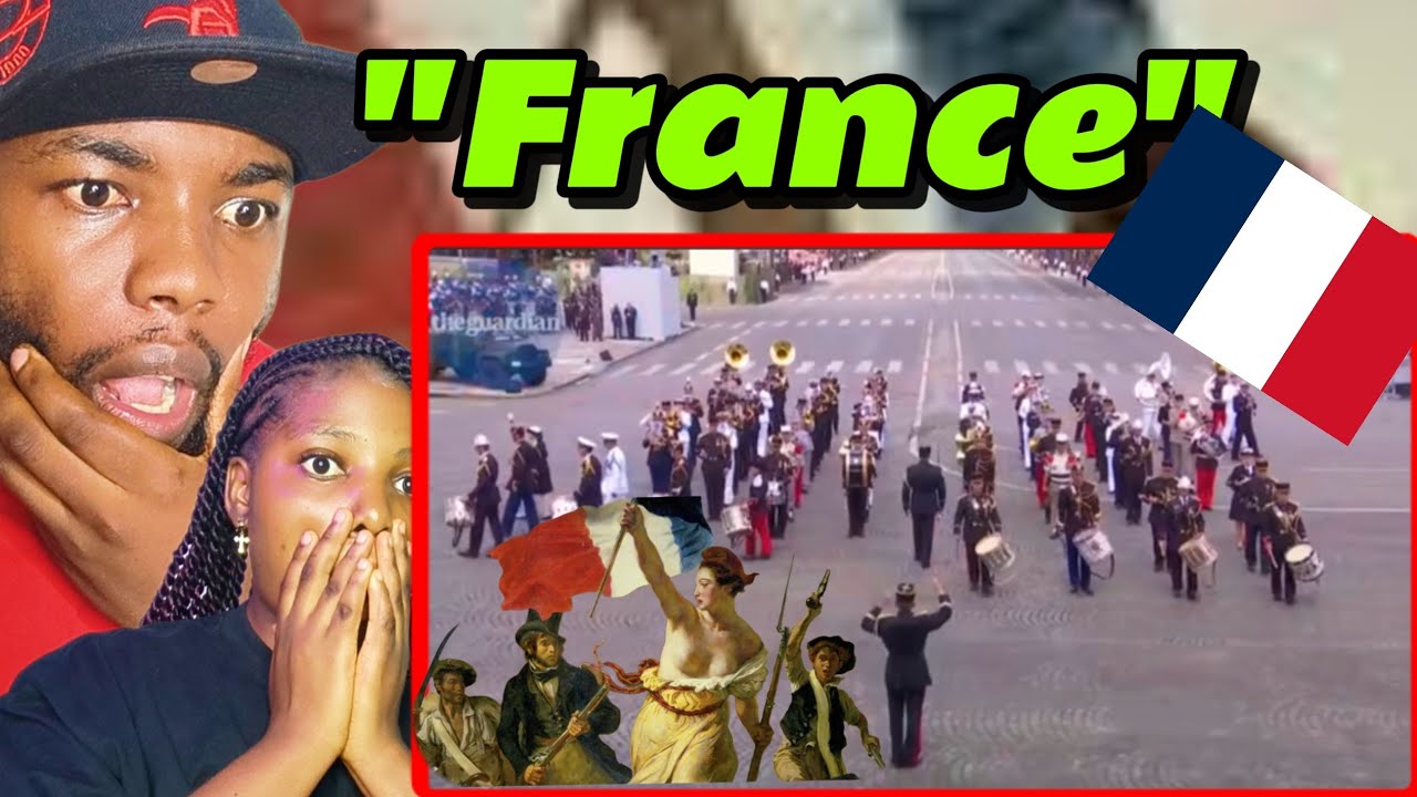 African Couple Watches Bastille Day Parade for the First Time