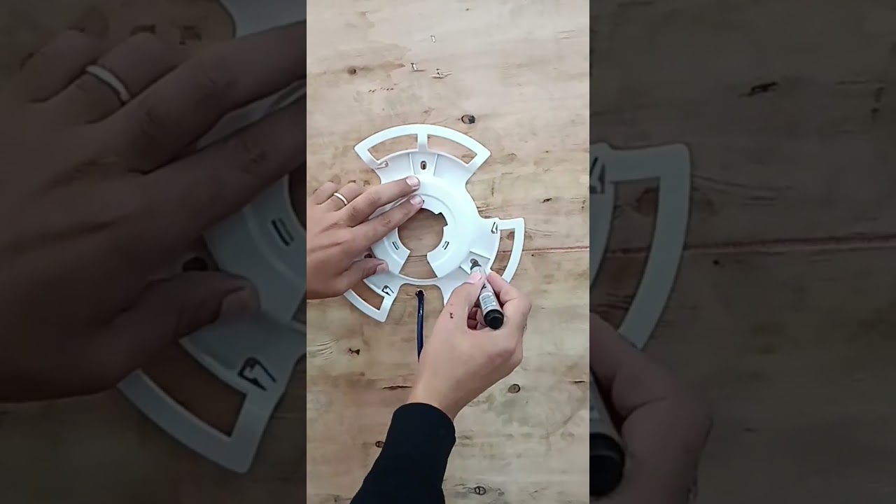 Fixation d' un projecteur apparent pour la piscine NIKITA CCEI .