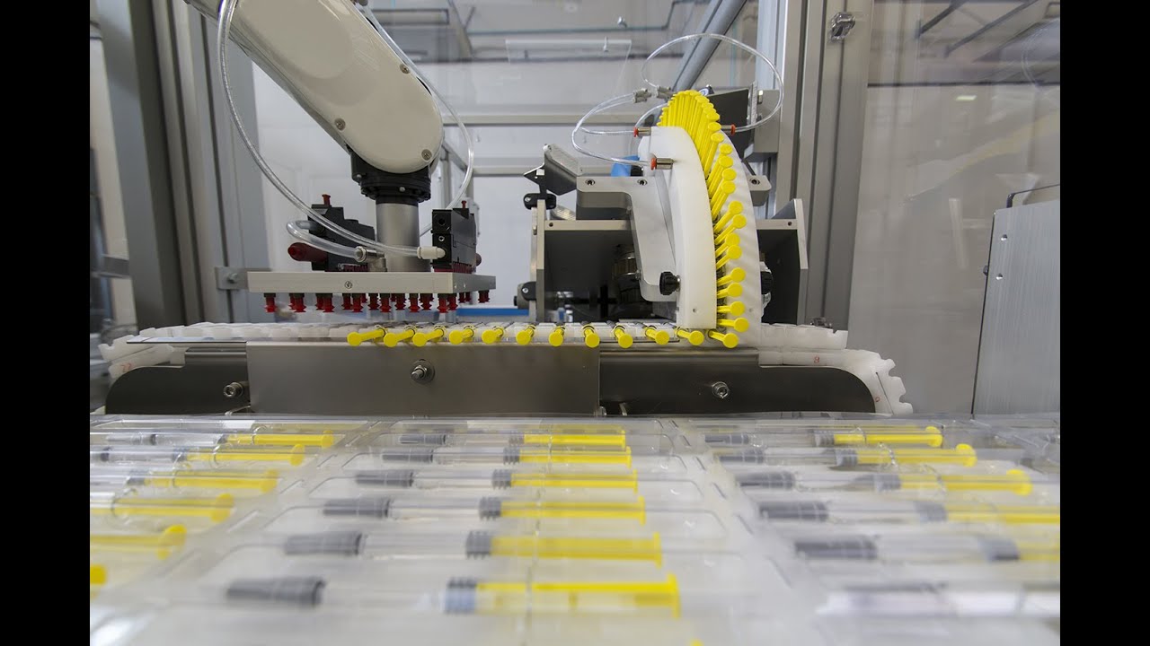 Pre-filled syringes packaging line