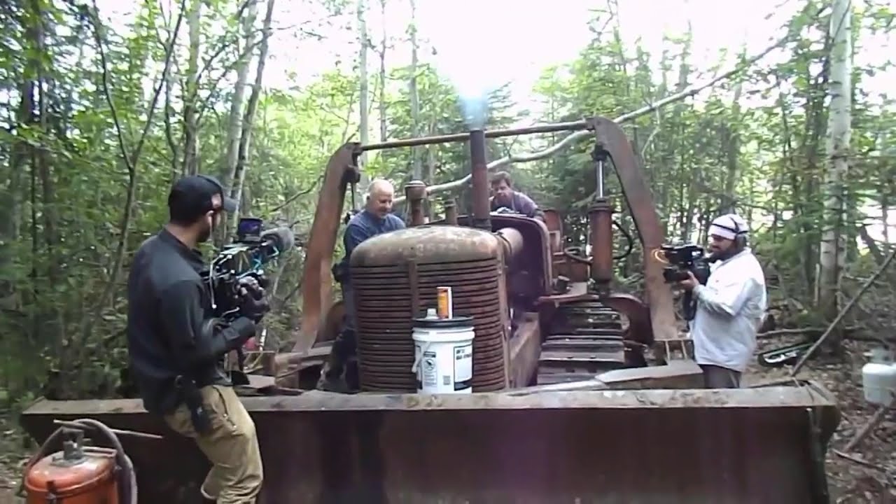 Mike, Stan and Film crew Start the Bulldozer  Stan Zuray