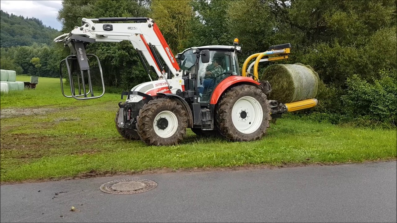 3 Schnitt 2017 Ballenwickeln mit Steyr Multi 4095 und Tanco 1310 EH Autowarp
